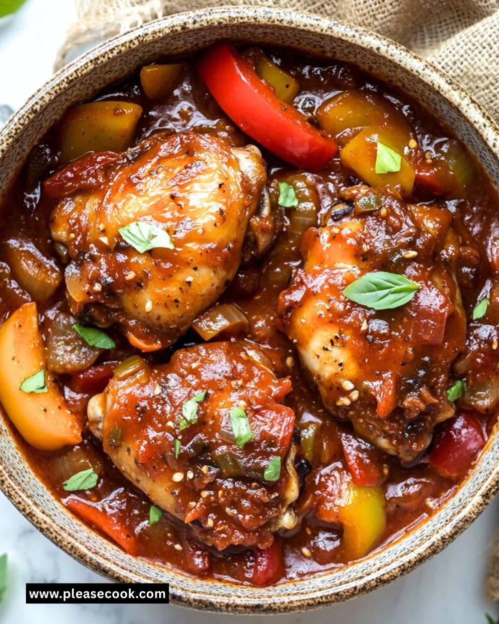 Delicious Crockpot Chicken Cacciatore in a serving dish with vegetables