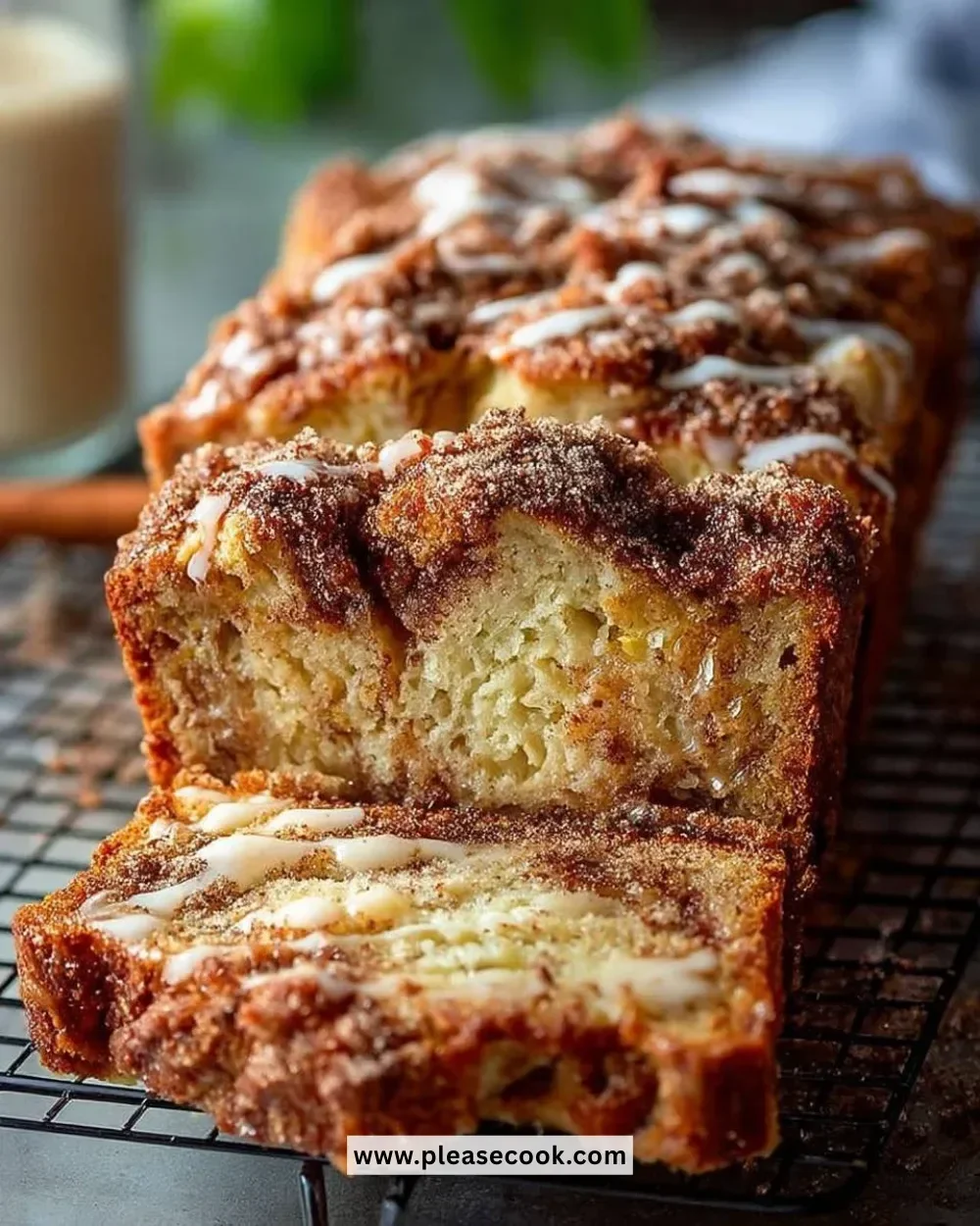 Deliciously baked Apple Cinnamon Bread with slices showing apple and cinnamon swirls