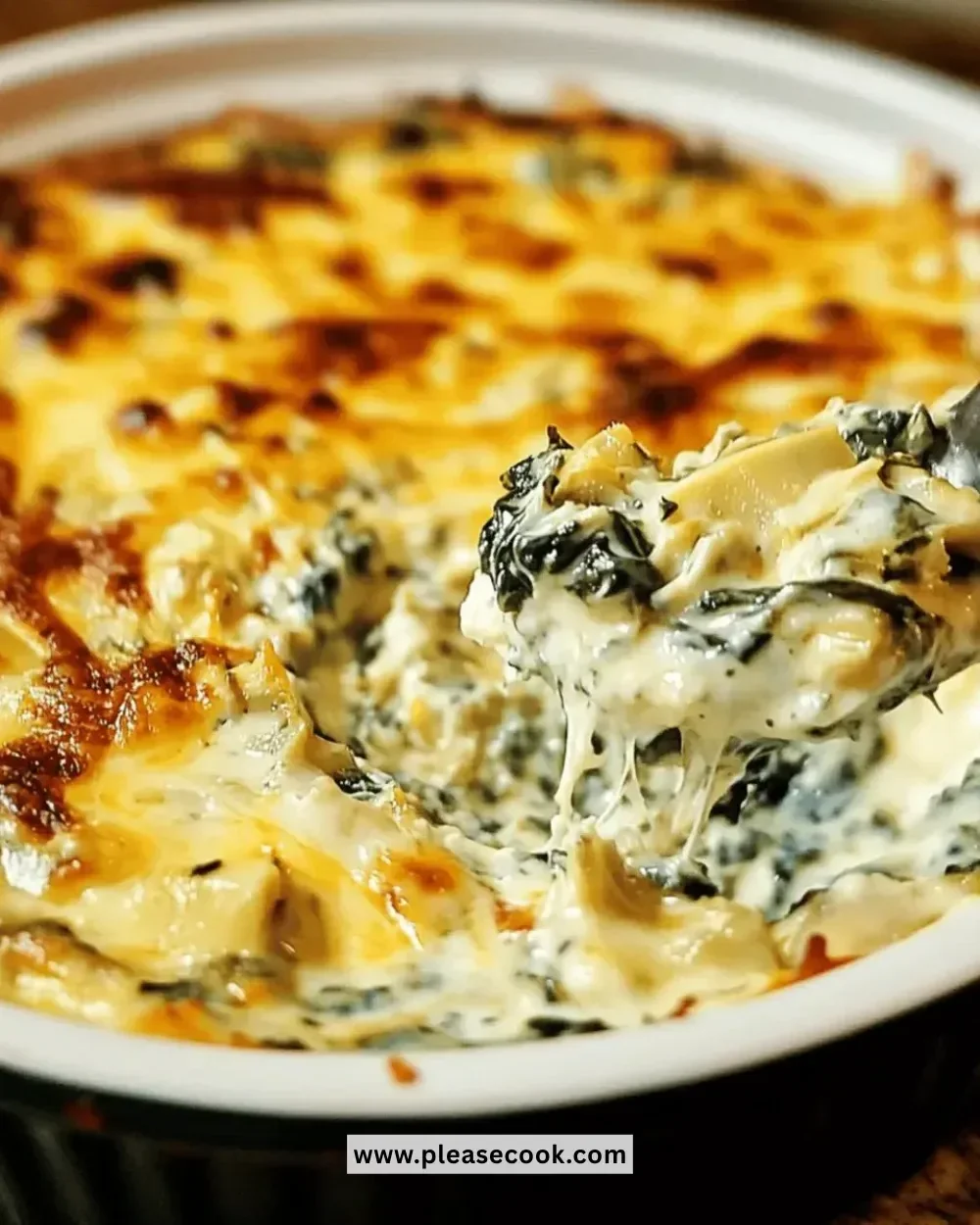 Delicious creamy spinach artichoke dip served in a bowl.