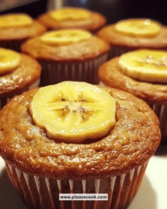 Freshly baked gluten-free banana muffins on a wooden table