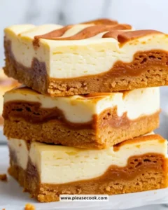Delicious cheesecake swirl snickerdoodle bars topped with cinnamon sugar