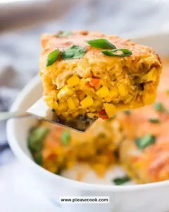 Delicious cornbread casserole served in a baking dish