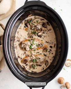 Crockpot creamy chicken and mushrooms dish served in a bowl