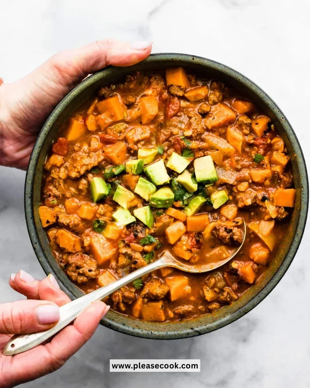 Bowl of Crockpot Sweet Potato Chili with fresh toppings