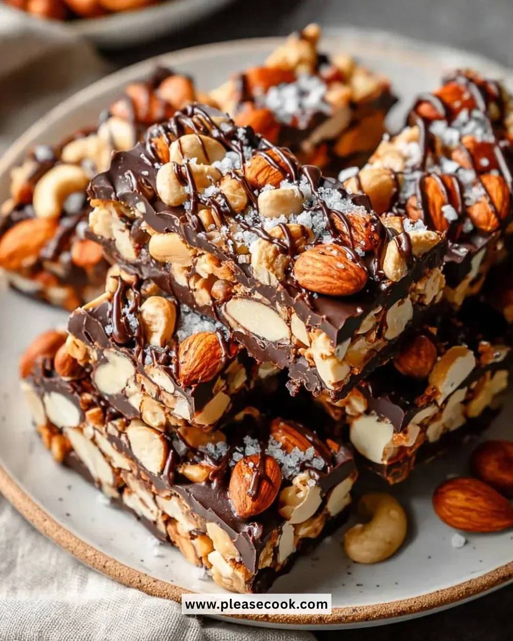 Dark chocolate sea salt nuts mix in a bowl, a delicious and healthy snack.