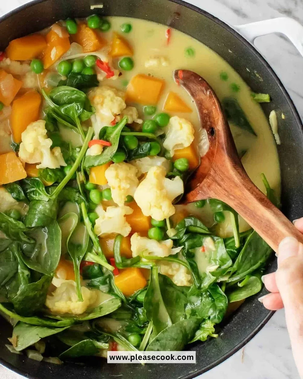 Bowl of easy coconut curry with vegetables and cilantro garnish