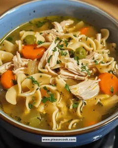 Bowl of Easy Instant Pot Chicken Noodle Soup with fresh herbs and vegetables