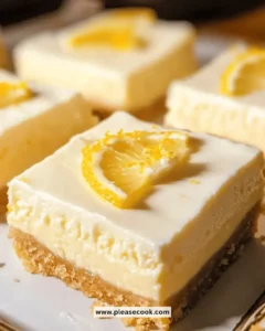 Delicious easy lemon cheesecake bars served on a platter