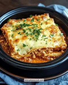 Homemade Slow-Cooker Lasagne layered with pasta, ricotta, and marinara sauce