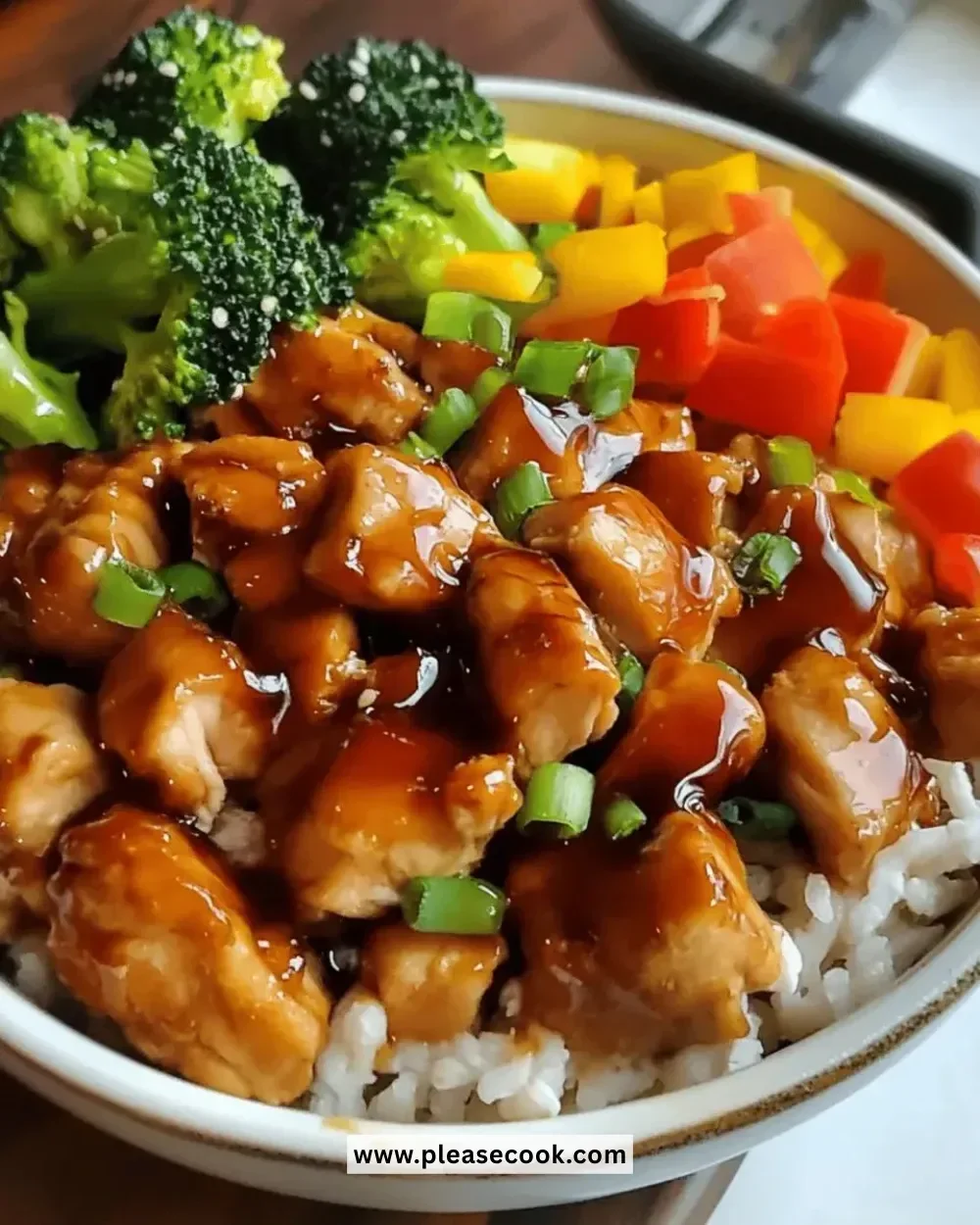 Delicious sweet teriyaki chicken bowls with vibrant vegetables and rice