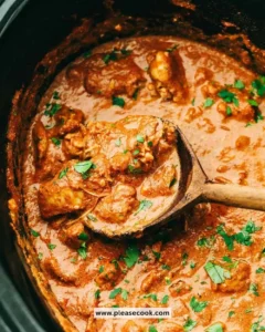 Slow cooker chicken tikka masala served with rice and naan