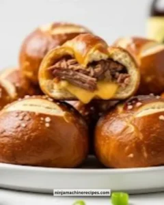 Delicious smoked brisket and beer cheese stuffed pretzel bombs