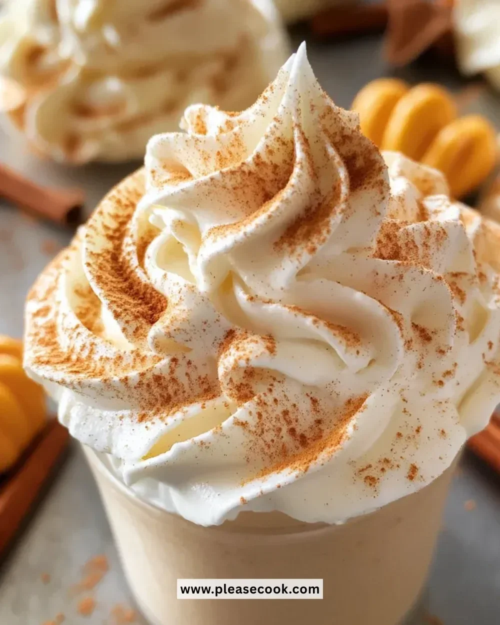 Starbucks Pumpkin Spice Whipped Cream topping on a cozy fall drink