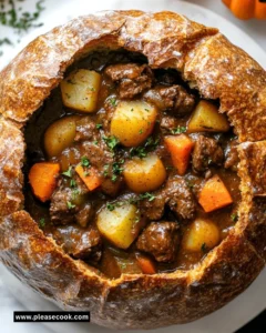 A bowl of Witch's Cauldron Beef Stew with vegetables and herbs