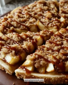 Delicious apple crisp pizza dessert topped with fresh apples and crumbles