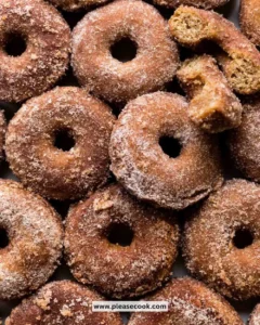 Delicious baked apple cider donuts topped with cinnamon sugar