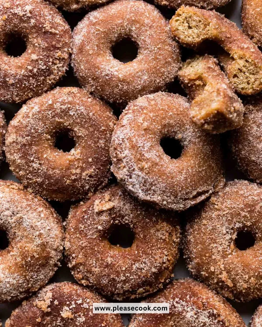 Delicious baked apple cider donuts topped with cinnamon sugar