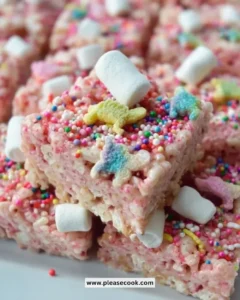 Colorful Circus Animal Cookie Rice Krispie Treats stacked on a plate