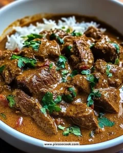 Coconut-Infused Beef Curry with tender beef and aromatic spices in a bowl
