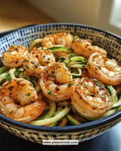 Easy 15-minute garlic shrimp served with zoodles on a plate
