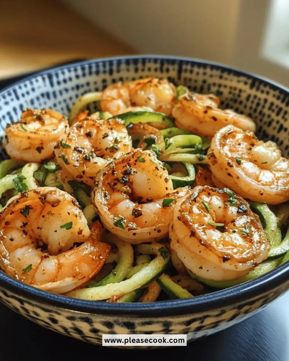 Easy 15-minute garlic shrimp served with zoodles on a plate