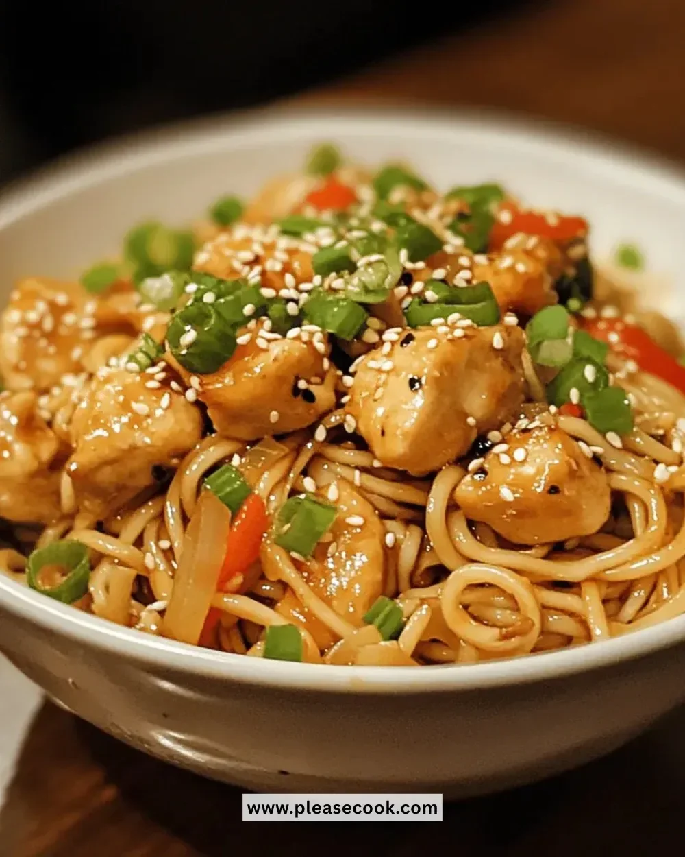 Delicious easy Asian sesame chicken noodles served in a bowl