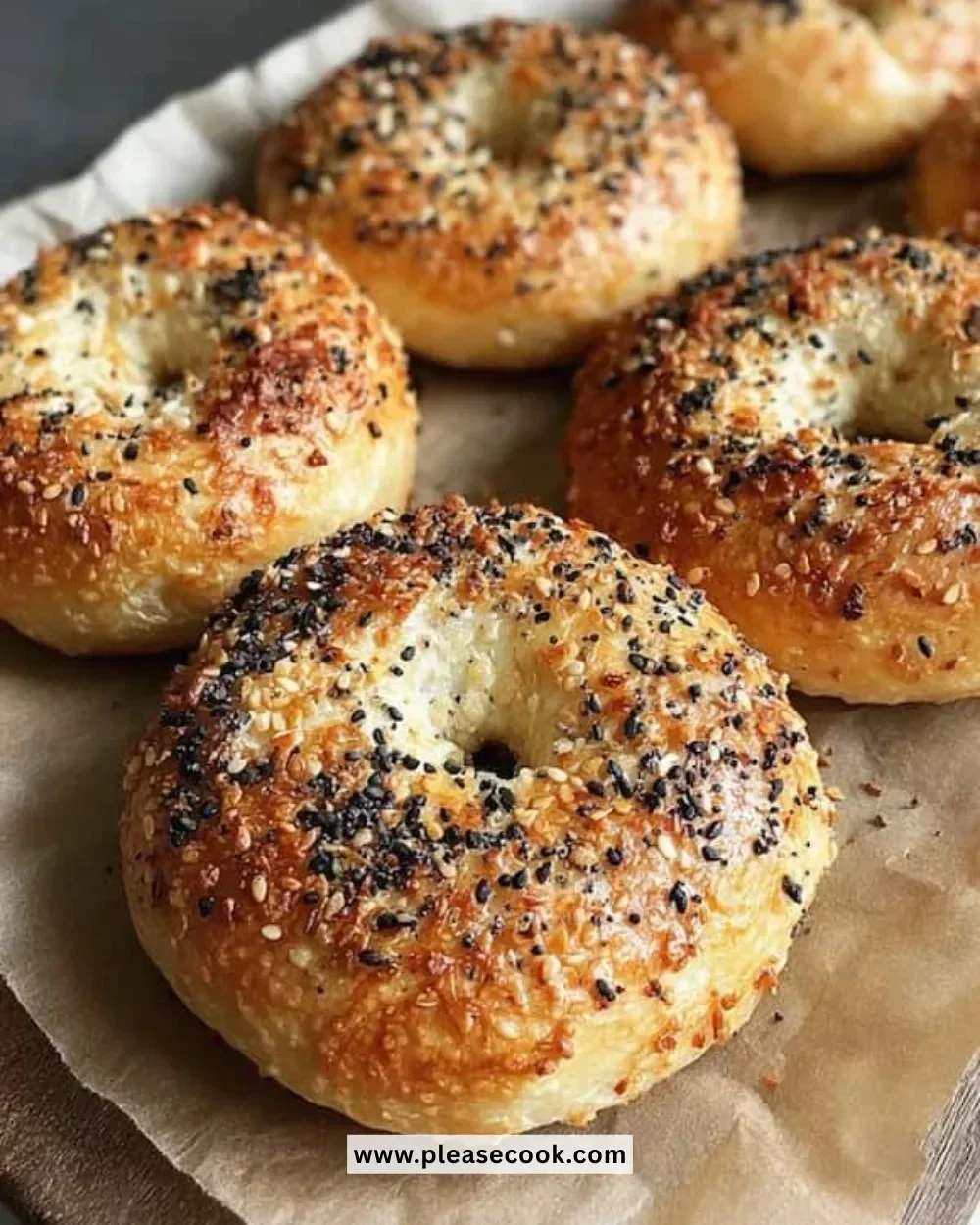 Homemade New York bagels fresh out of the oven, golden and chewy.