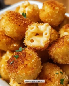 Delicious baked mac and cheese bites served on a plate with cheese melting
