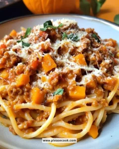 Delicious Pumpkin Bolognese served in a bowl with basil on top.