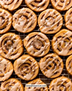 Delicious Pumpkin Spice Roll Cookies decorated with autumn-themed icing