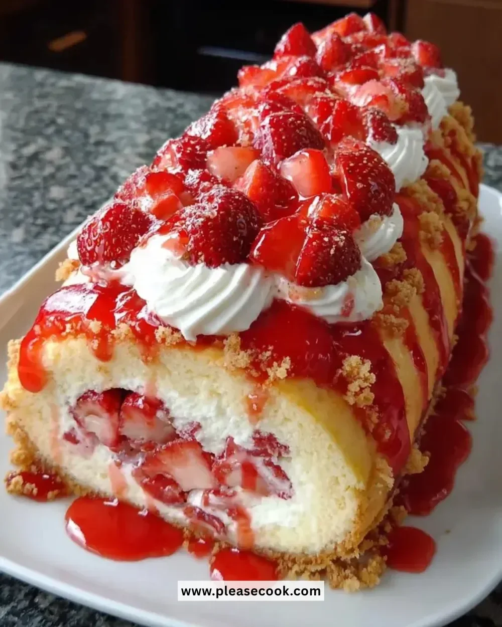 Delicious Strawberry Shortcake Cheesecake topped with fresh strawberries