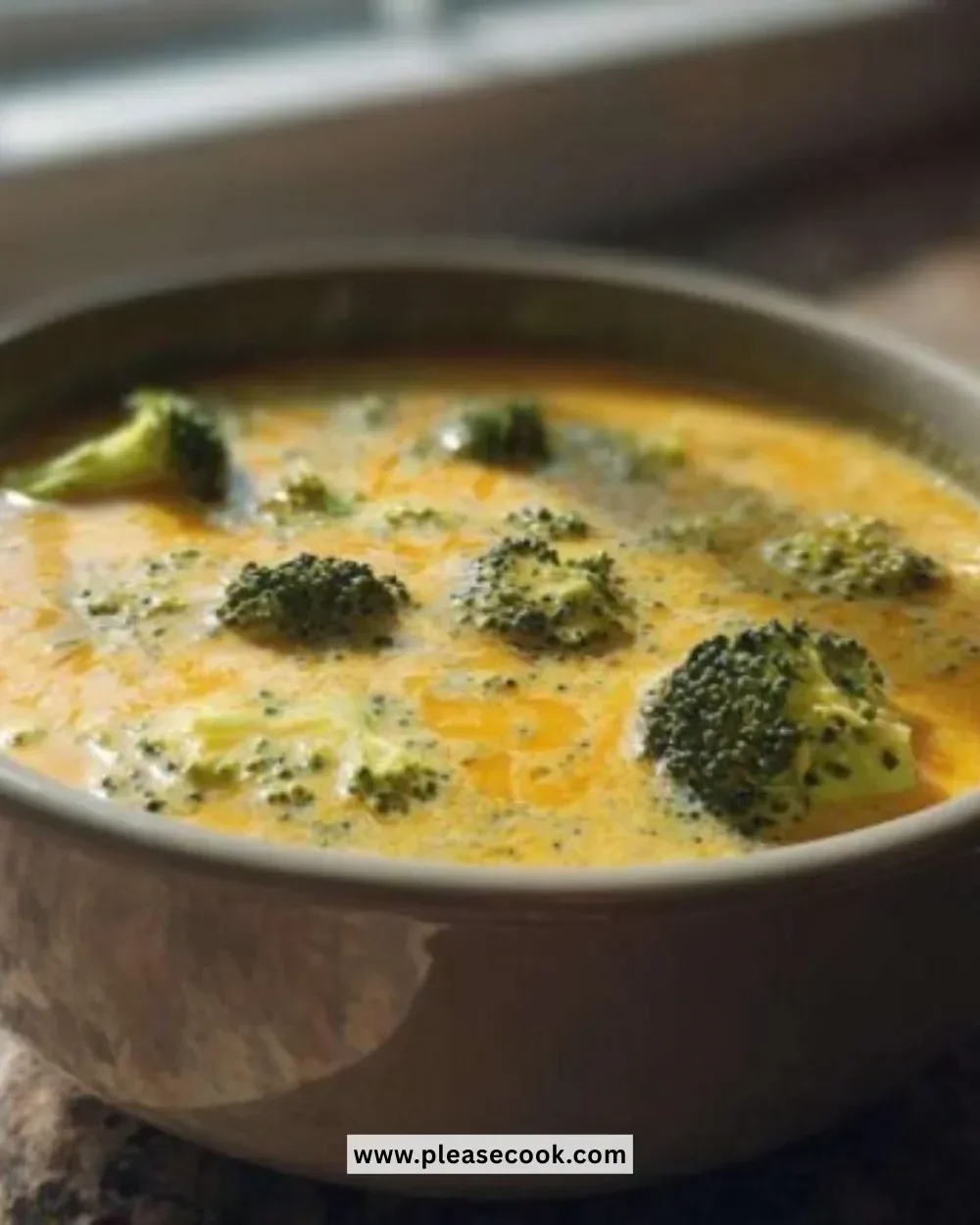 Creamy broccoli cheddar soup in a bowl, inspired by Panera's recipe