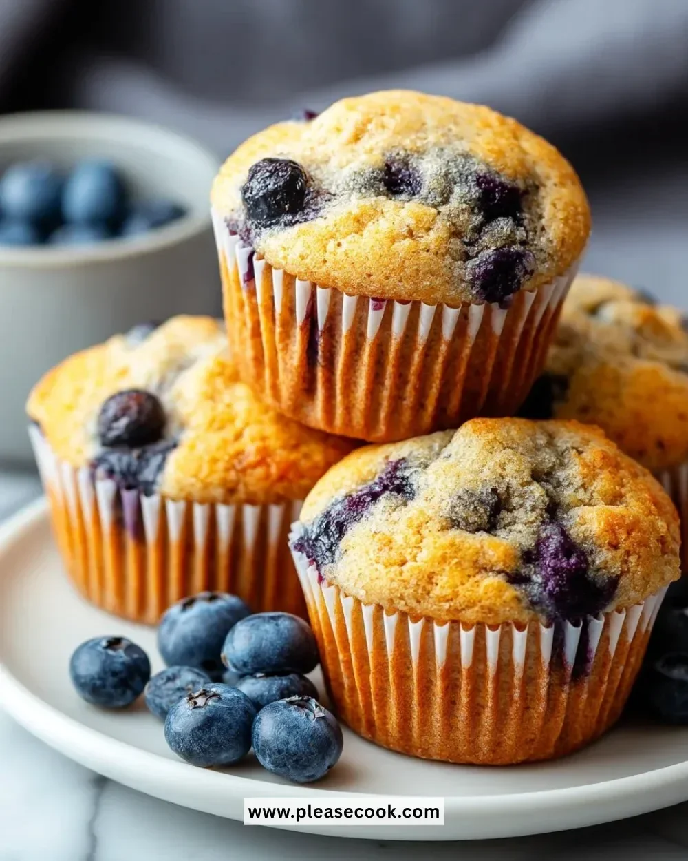 Freshly baked gluten-free blueberry muffins with juicy berries.