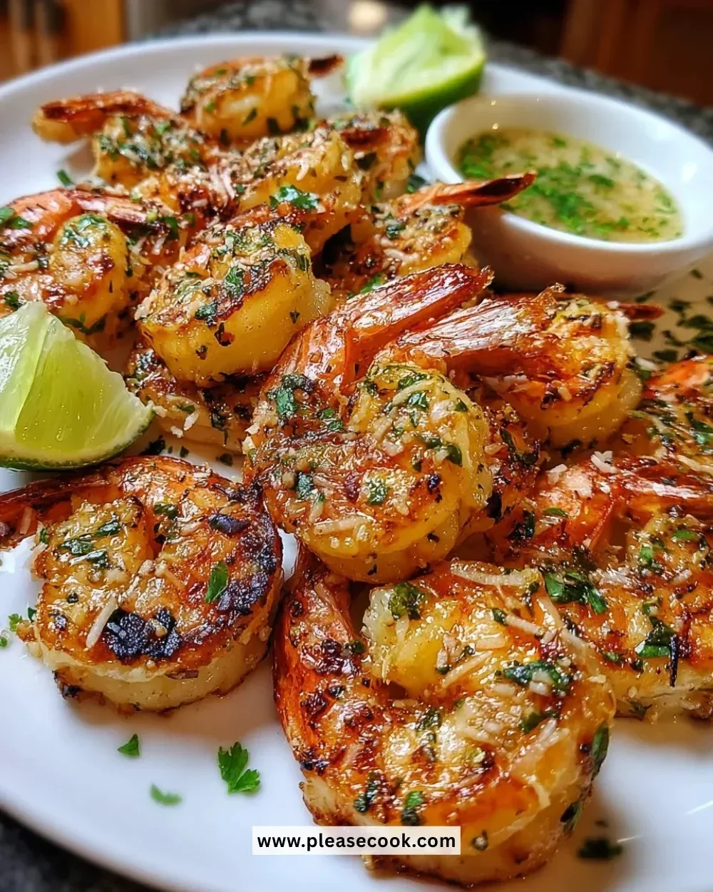 Delicious grilled coconut lime shrimp served on a plate with garnishes.