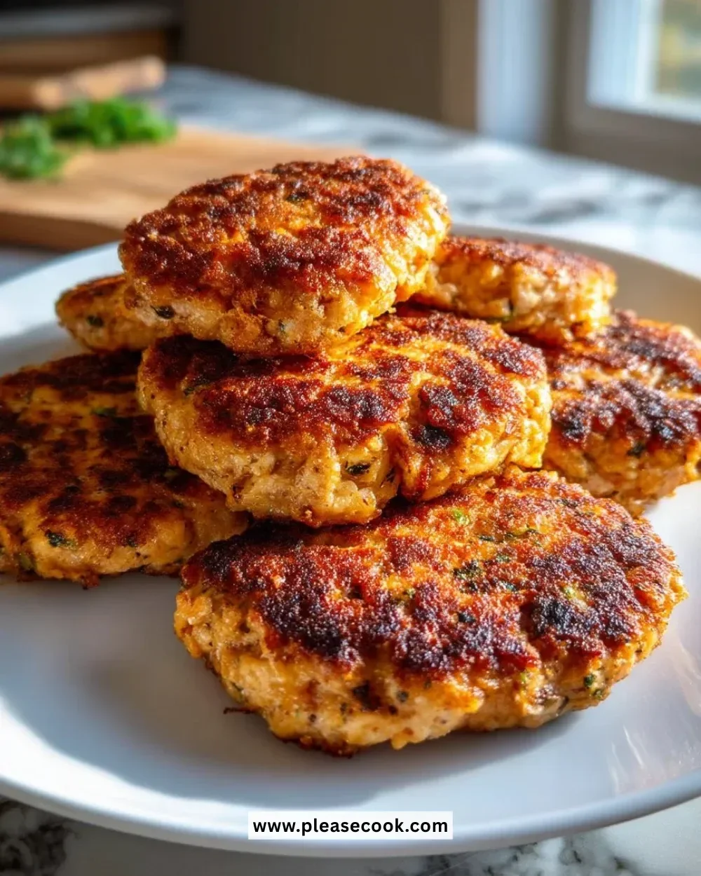 Juicy chicken patties cooked to perfection, ideal for burgers and meals.