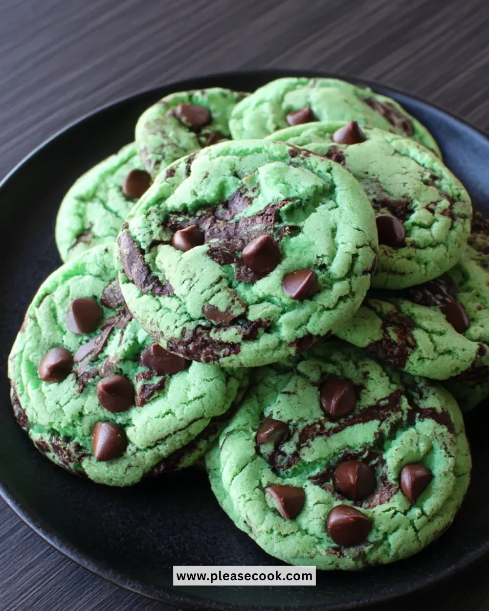 Freshly baked Mint Chocolate Chip Cookies on a cooling rack