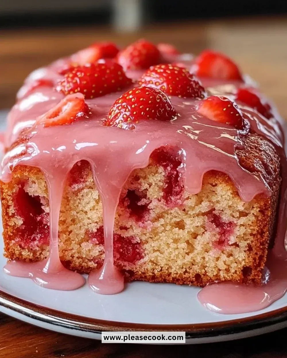 Delicious strawberry pound cake with a glossy strawberry glaze on top.
