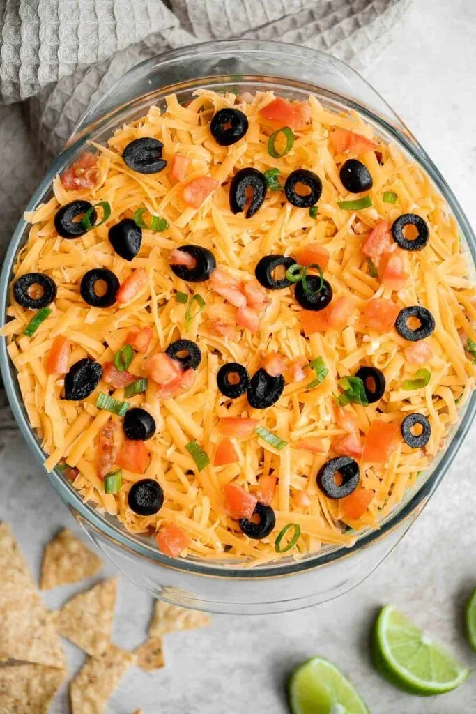 Delicious 7 Layer Dip served in a colorful dish