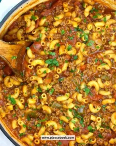 Delicious bowl of American Goulash with pasta, beef, and melted cheese