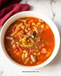 Bowl of Amish beef and vegetable soup with fresh ingredients