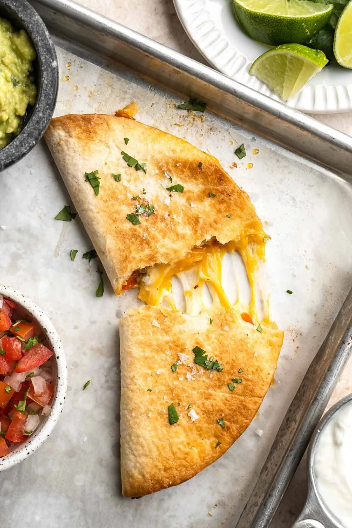 Golden baked chicken quesadillas filled with cheese and vegetables