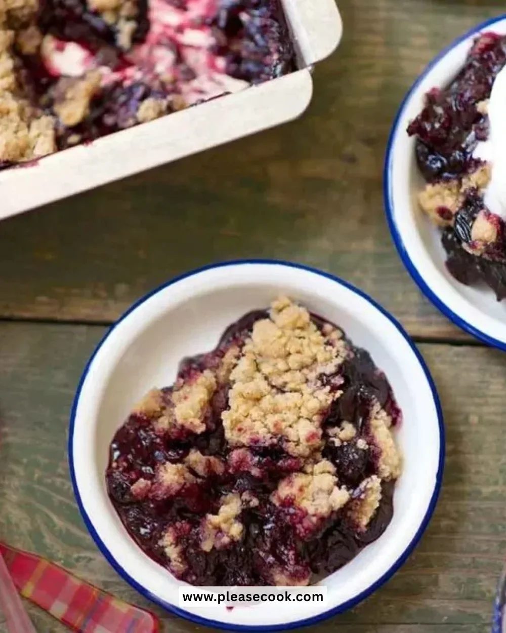 Delicious serving of homemade blueberry crisp dessert with crispy topping