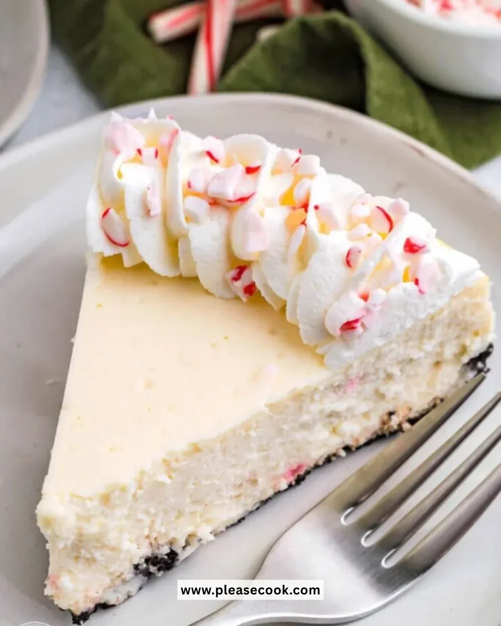 Delicious Candy Cane Cheesecake topped with crushed candy canes