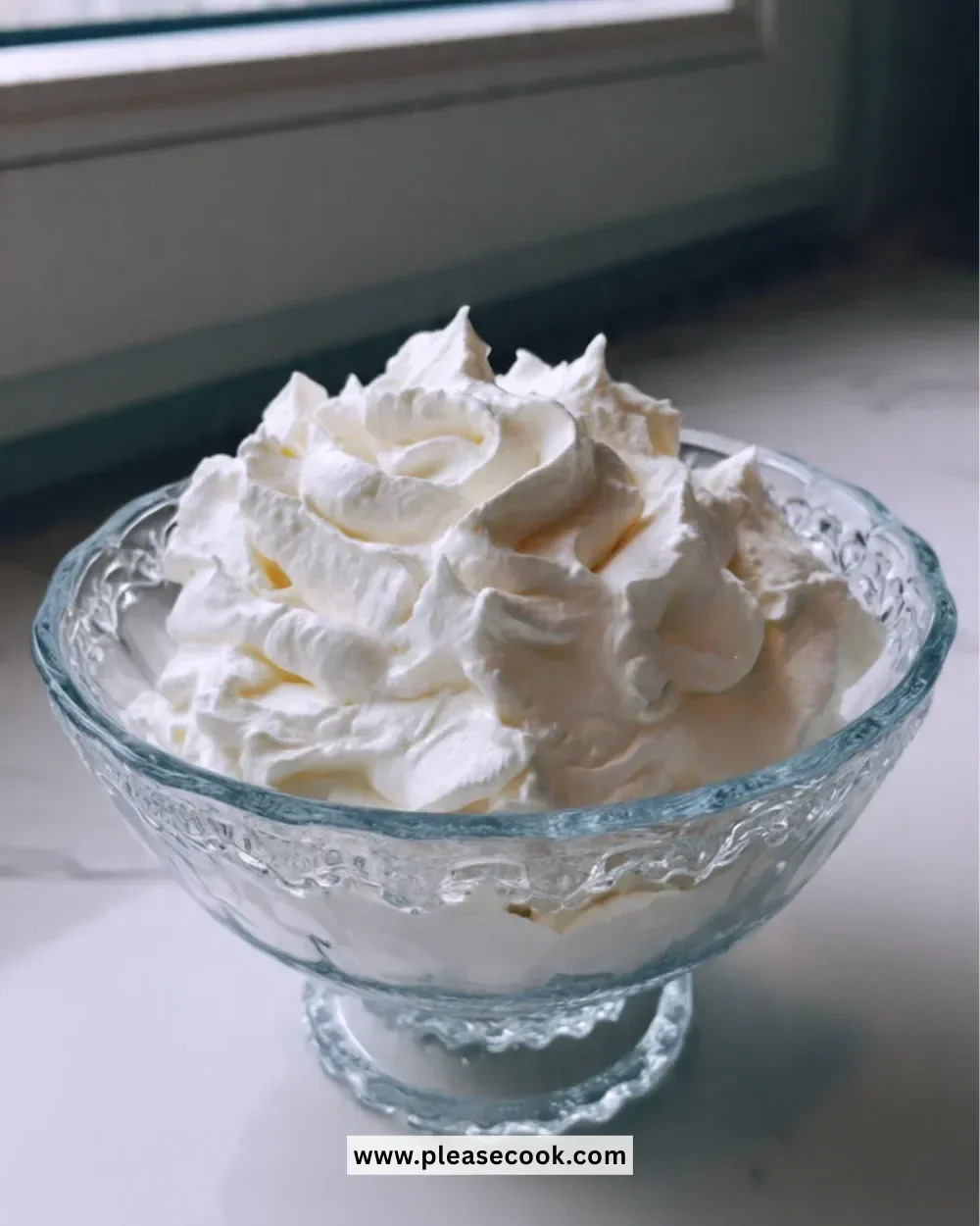 Delicious homemade Chantilly Cream in a bowl, ready for dessert topping.