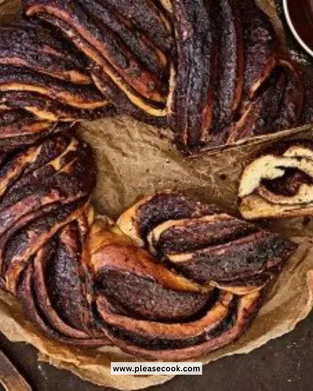 Chocolate Babka Wreath, a beautifully braided sweet bread with rich chocolate filling.