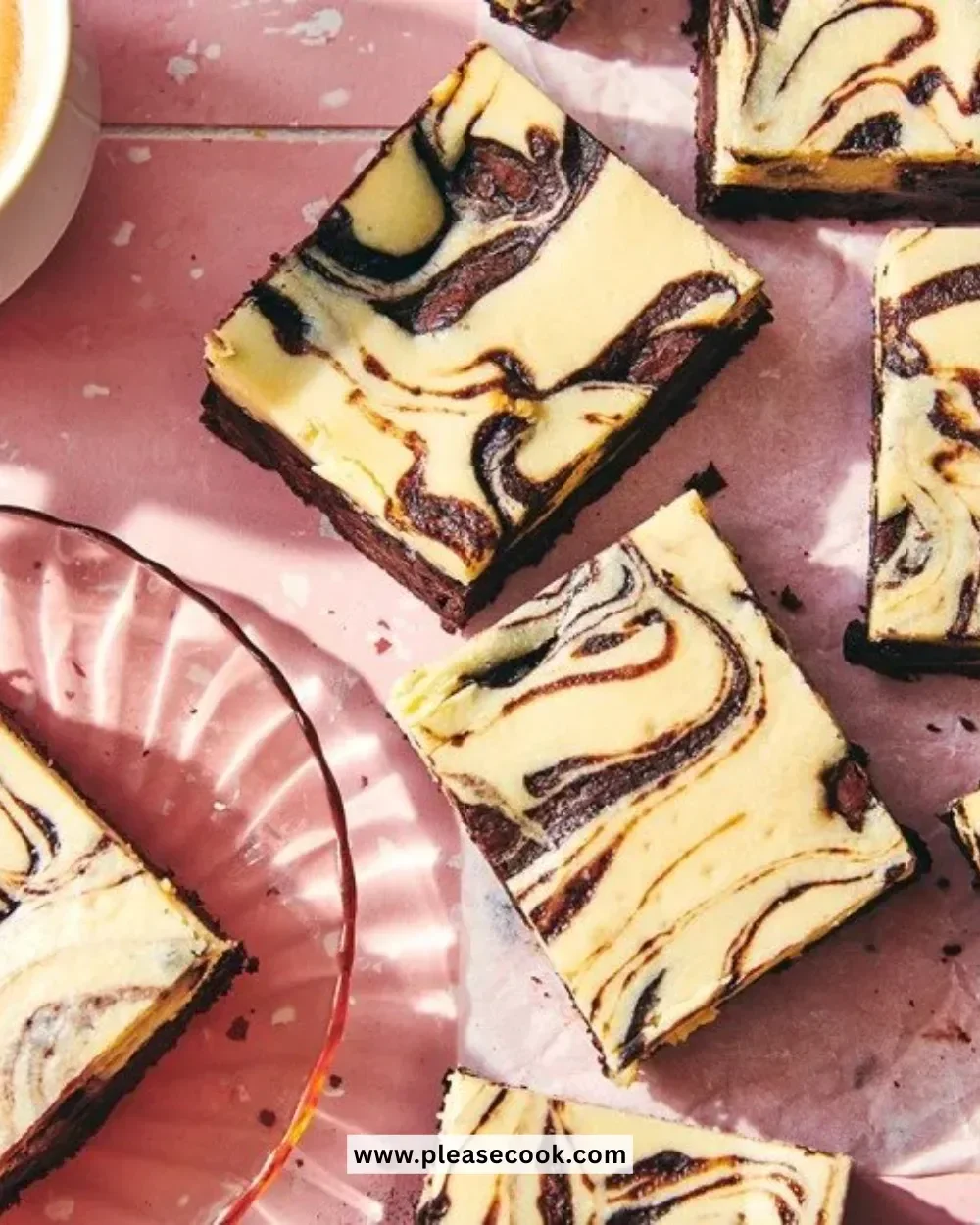 Delicious chocolate cheesecake brownies topped with creamy cheesecake layer.