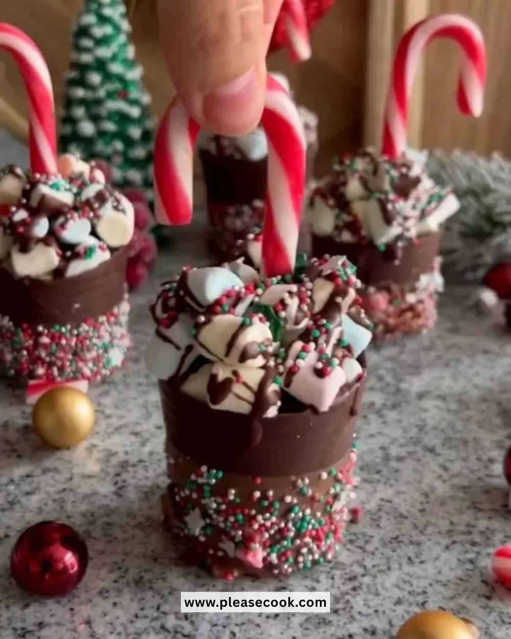 Christmas chocolate hot cups filled with rich chocolate and festive toppings.