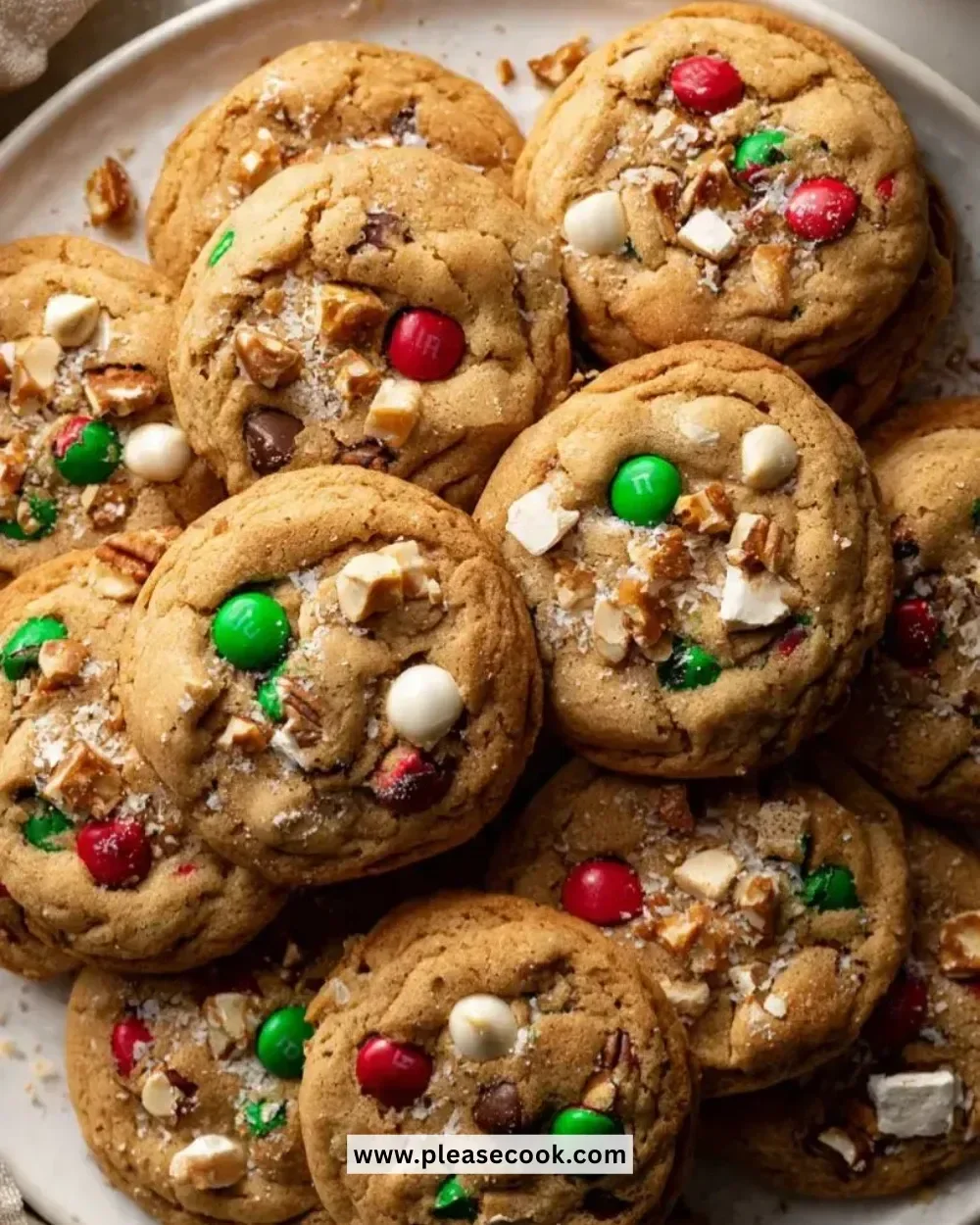 Batch of colorful Christmas Kitchen Sink Cookies on a festive plate.