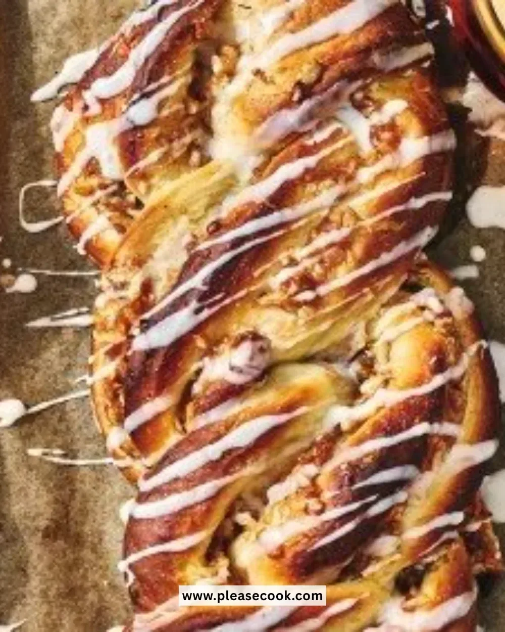 Freshly baked Cinnamon Apple Twist Bread with apples and cinnamon swirls.