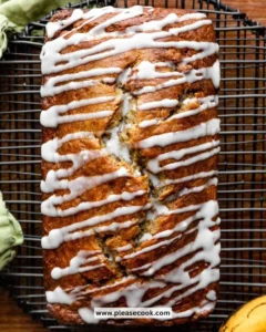 Delicious Cinnamon Swirl Banana Bread sliced on a wooden board